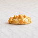 PF Empanadas egg and cheese empanada cut open to show the breakfast filling