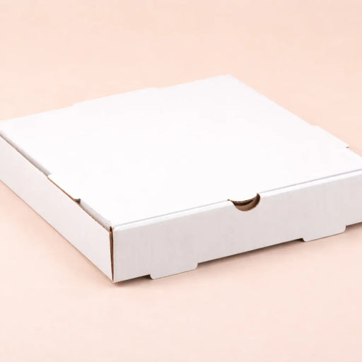 Closed white pizza takeaway box