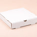 Closed white pizza takeaway box